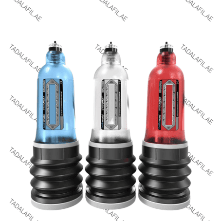 Three male enhancement pump devices in blue, silver, and red colors displayed on a white background.