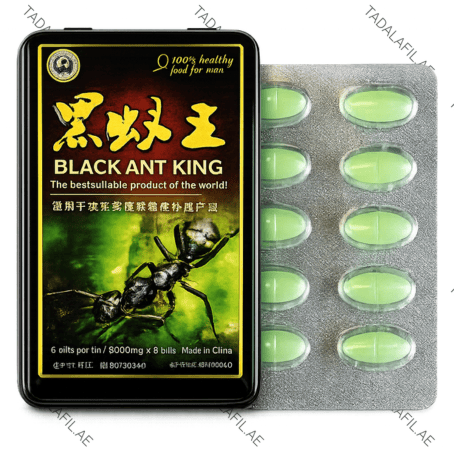 Black Ant King Power Tablet tin box and green tablet blister pack on white background