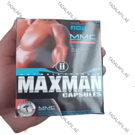 MaxMan XI Capsules packaging box held in hand on white background